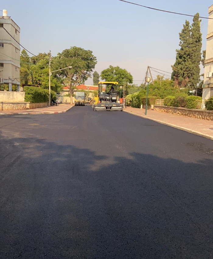 רכב עבודה מבצע סיום סלילת כבישים בשכונת קפלן