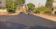 רכב עבודה מבצע סיום סלילת כבישים בשכונת קפלן